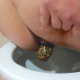 A plump, German girl is recorded from a close & nasty perspective as she shits into a toilet. She wipes her ass when finished. Presented in 720P HD. Over 2 minutes.